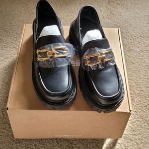 Black loafers